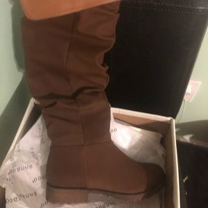 Brand new knee high boots , never worn